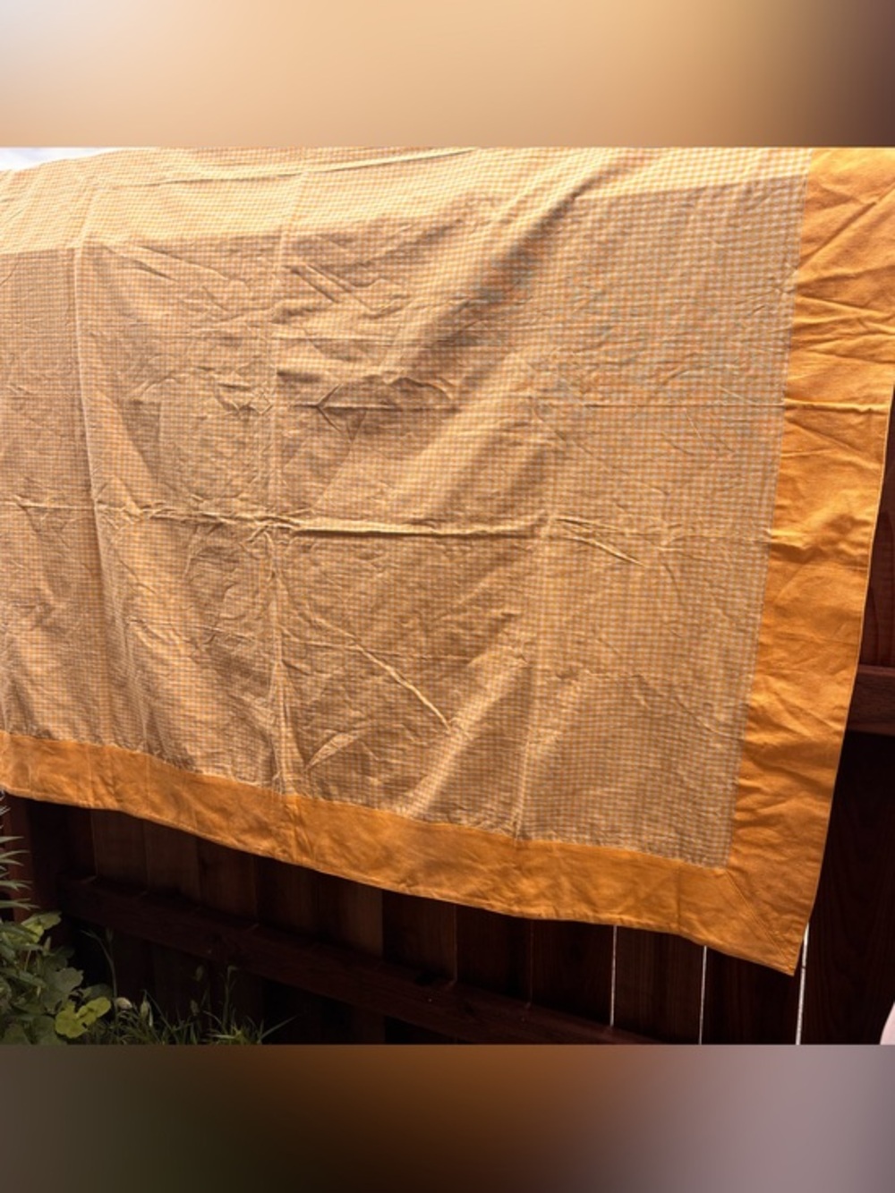 Yellow gingham tablecloth throw cover with yellow border